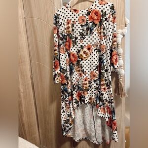Floral high low

Does not have size tag would say it’s 2X